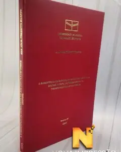 Encadernação capa dura vermelha com letras douradas UnB Brasília